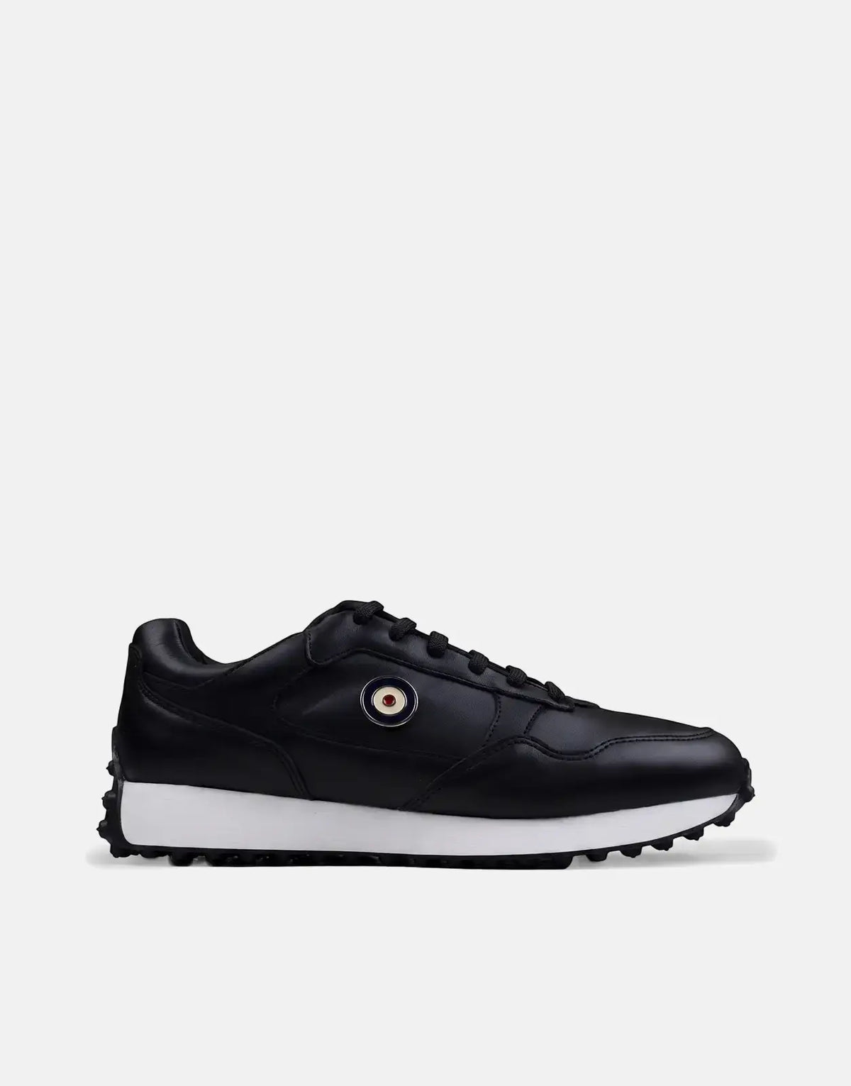 Ben Sherman Arthur black leather sneakers with white soles and a classic target logo, shown in a clean side profile.