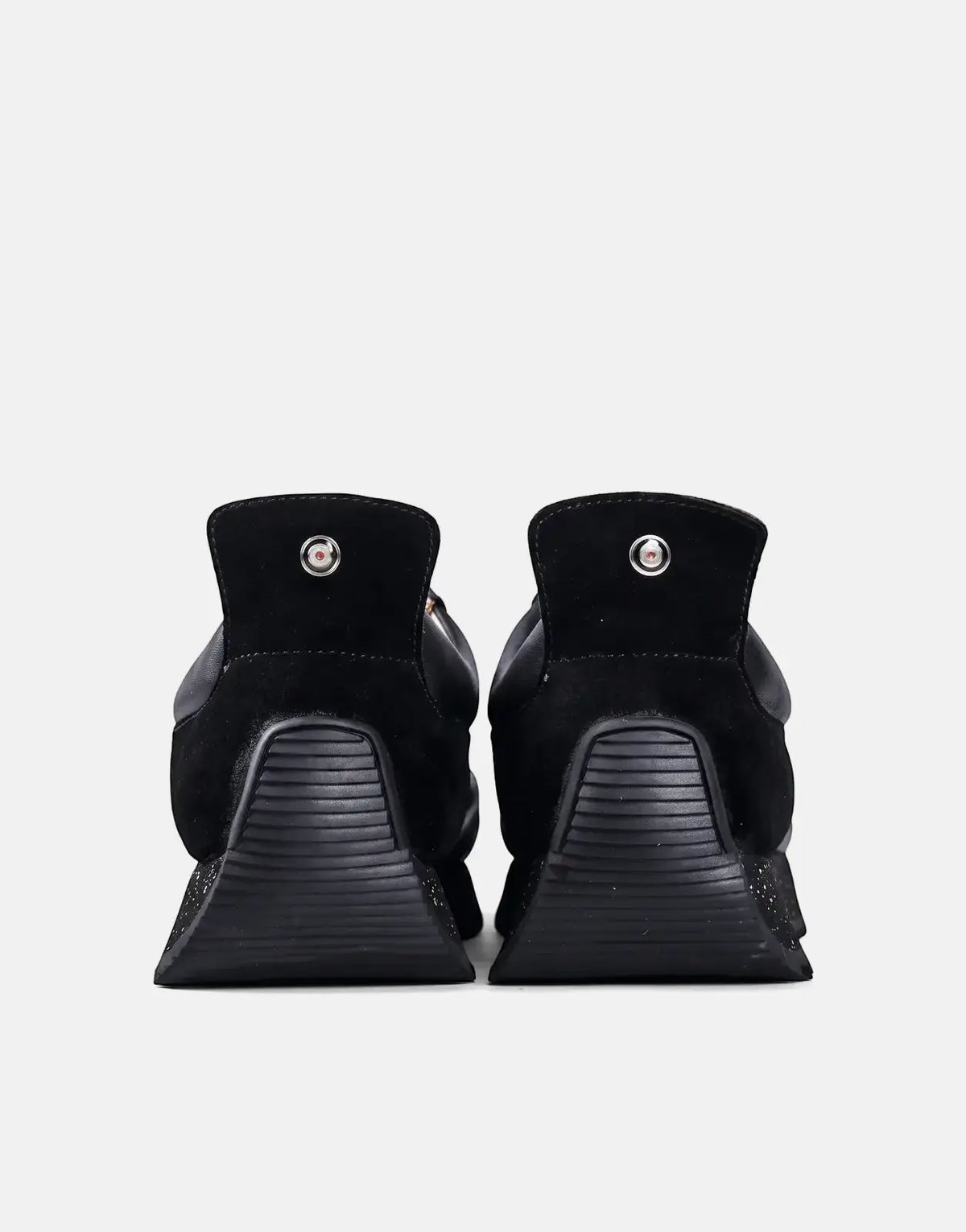 Rear view of two Ben Sherman Henry black leather and suede lace-up shoes, featuring textured soles and a distinctive heel