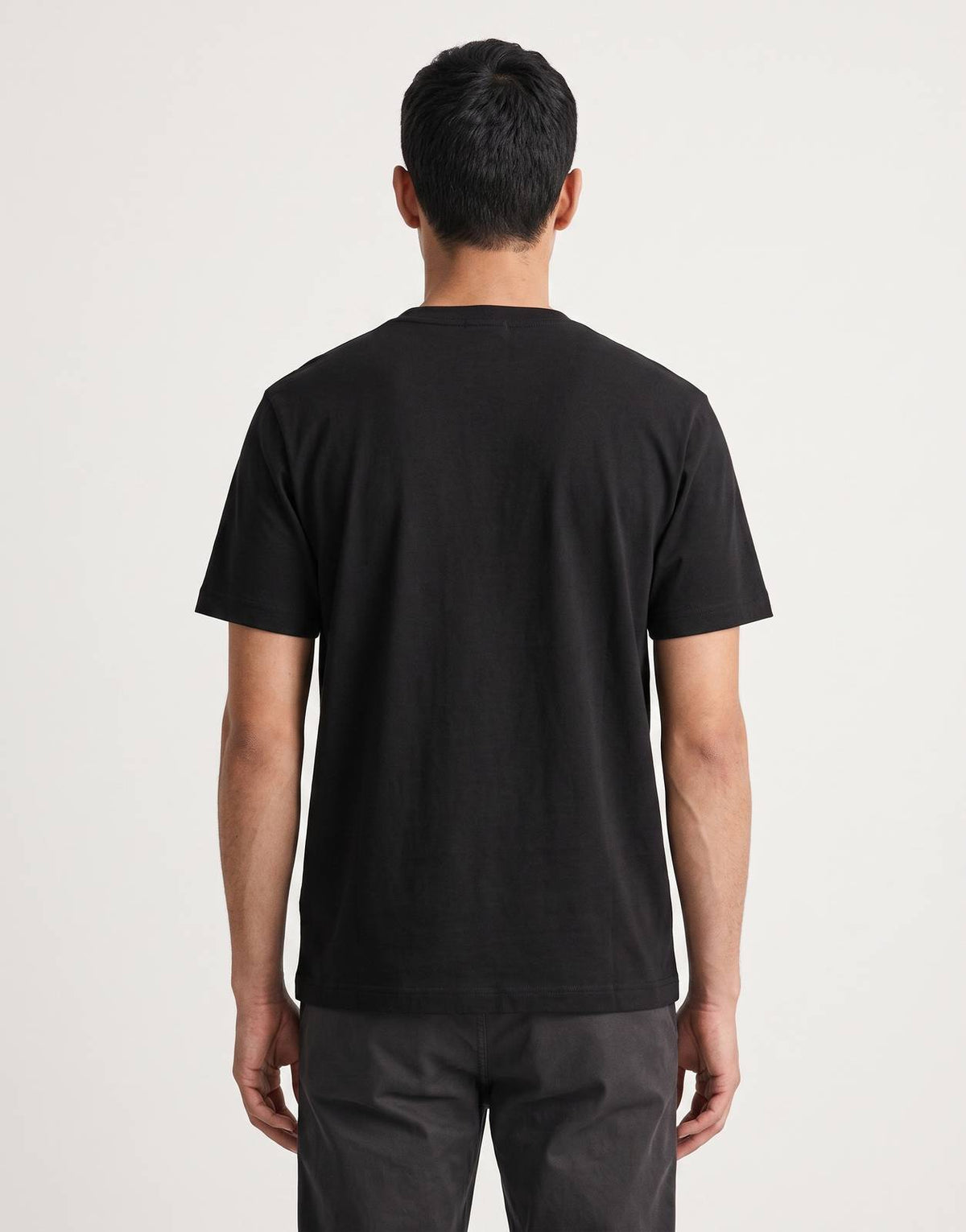 Back view of a Calvin Klein 20s 5AM black cotton t-shirt, laid flat against a white background.