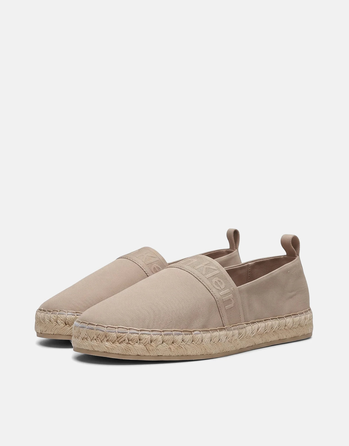 Light brown Calvin Klein Oblique Espadrille Webbing shoes, featuring braided soles and logo detailing on the canvas upper,