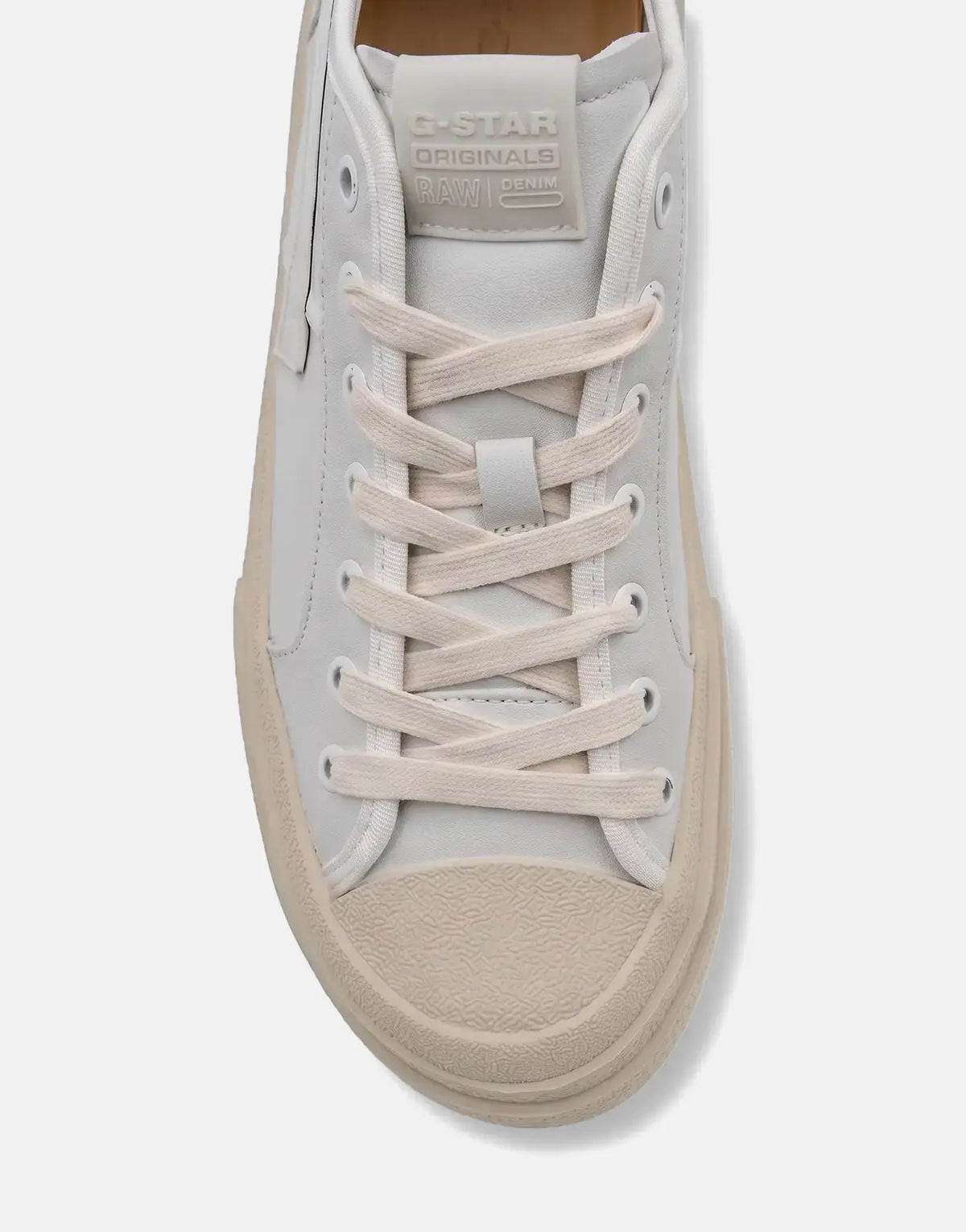 G-Star RAW Vodan Low Lea white leather sneakers, featuring cream laces and a textured toe cap, viewed from the top front.