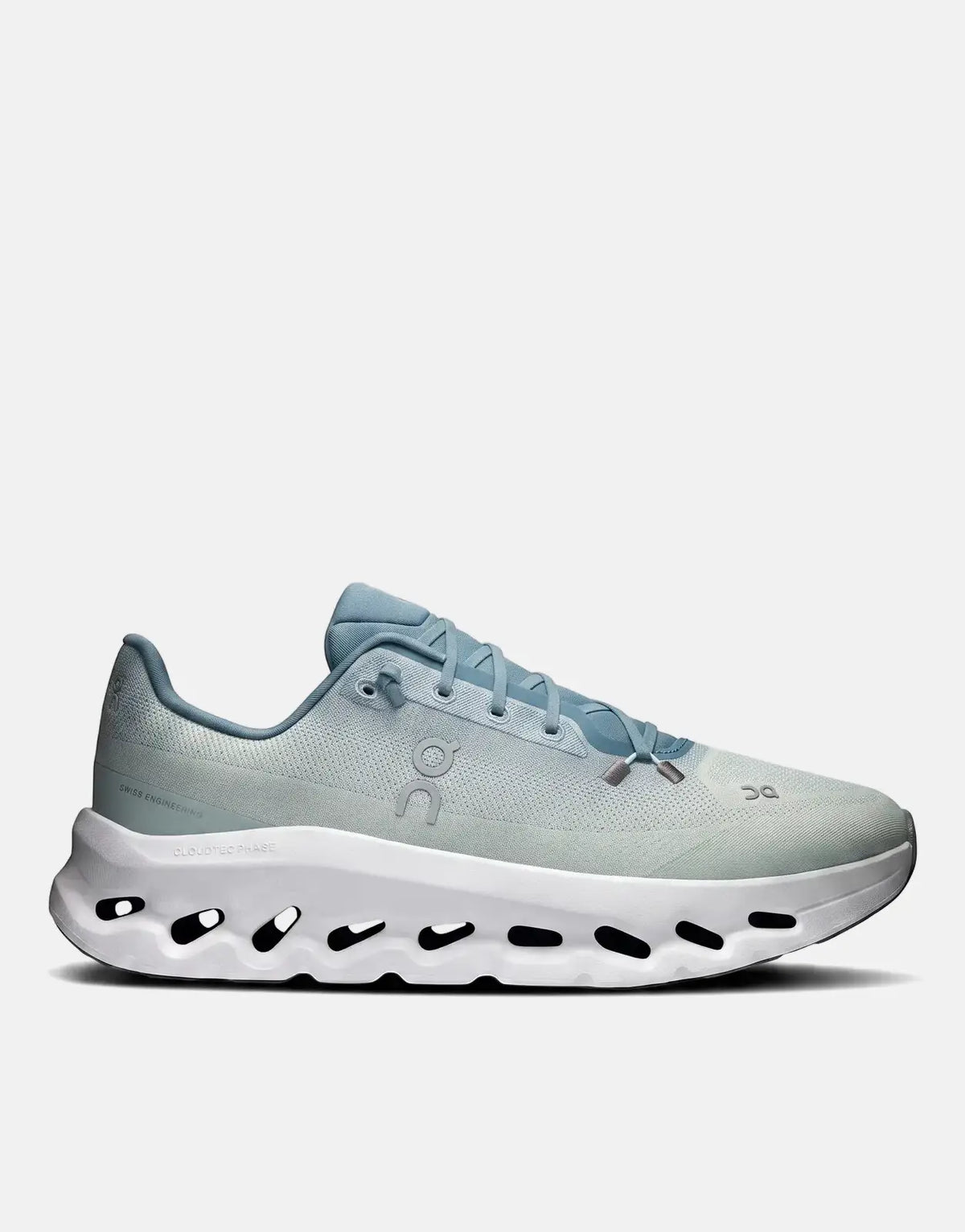On Men's Cloudtilt Tide Mineral sneaker in light blue with a distinctive white CloudTec Phase sole, shown in a side profile
