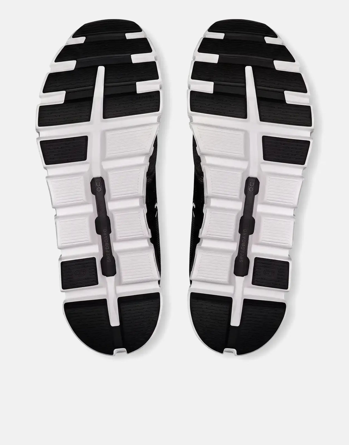 Soles of two On Men's Cloud 6 Black White Sneakers, featuring segmented CloudTec soles and branding.