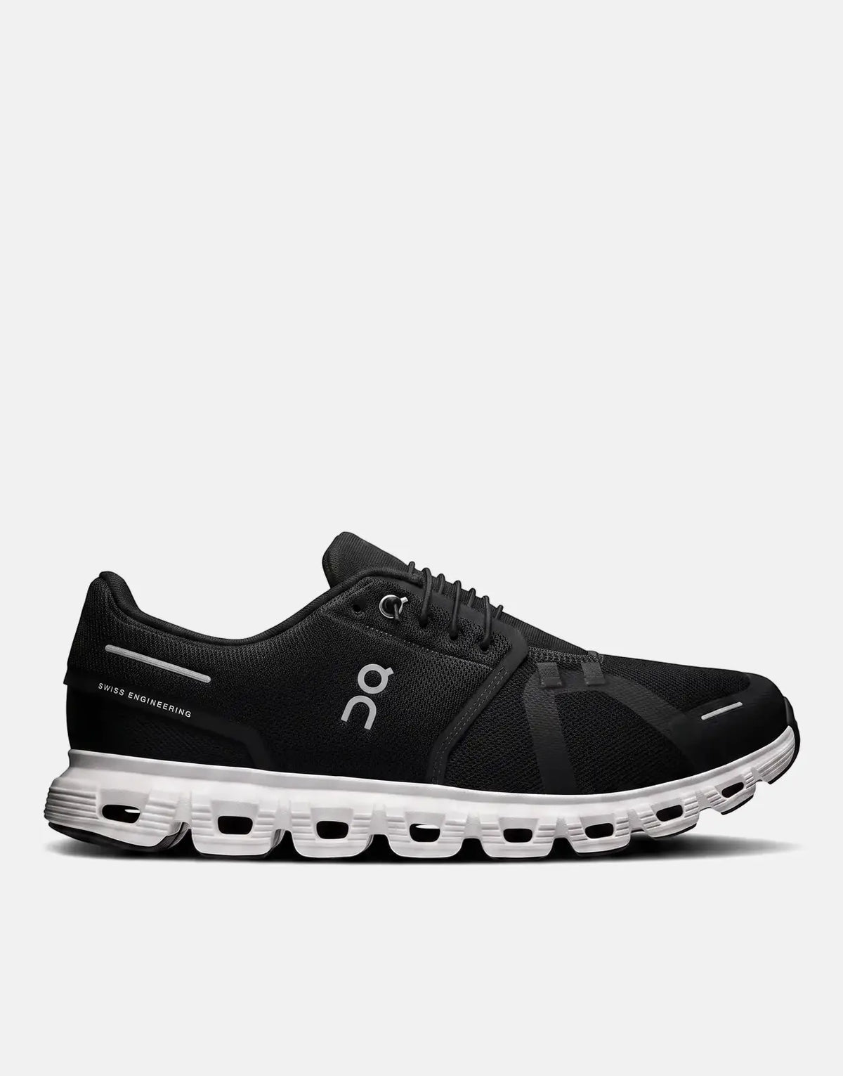 On Women's Cloud 6 running sneakers in black and white, featuring a mesh upper and a distinct cloud-shaped sole, viewed from