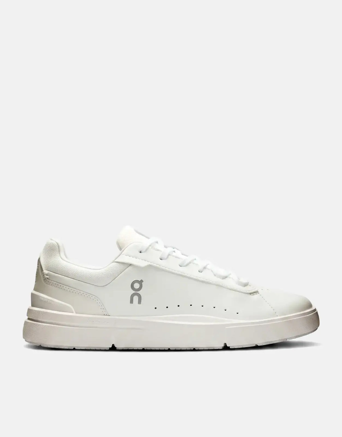 On Women's Roger Advantage sneaker in white, featuring a smooth leather upper and a low-profile design, shown from the side.