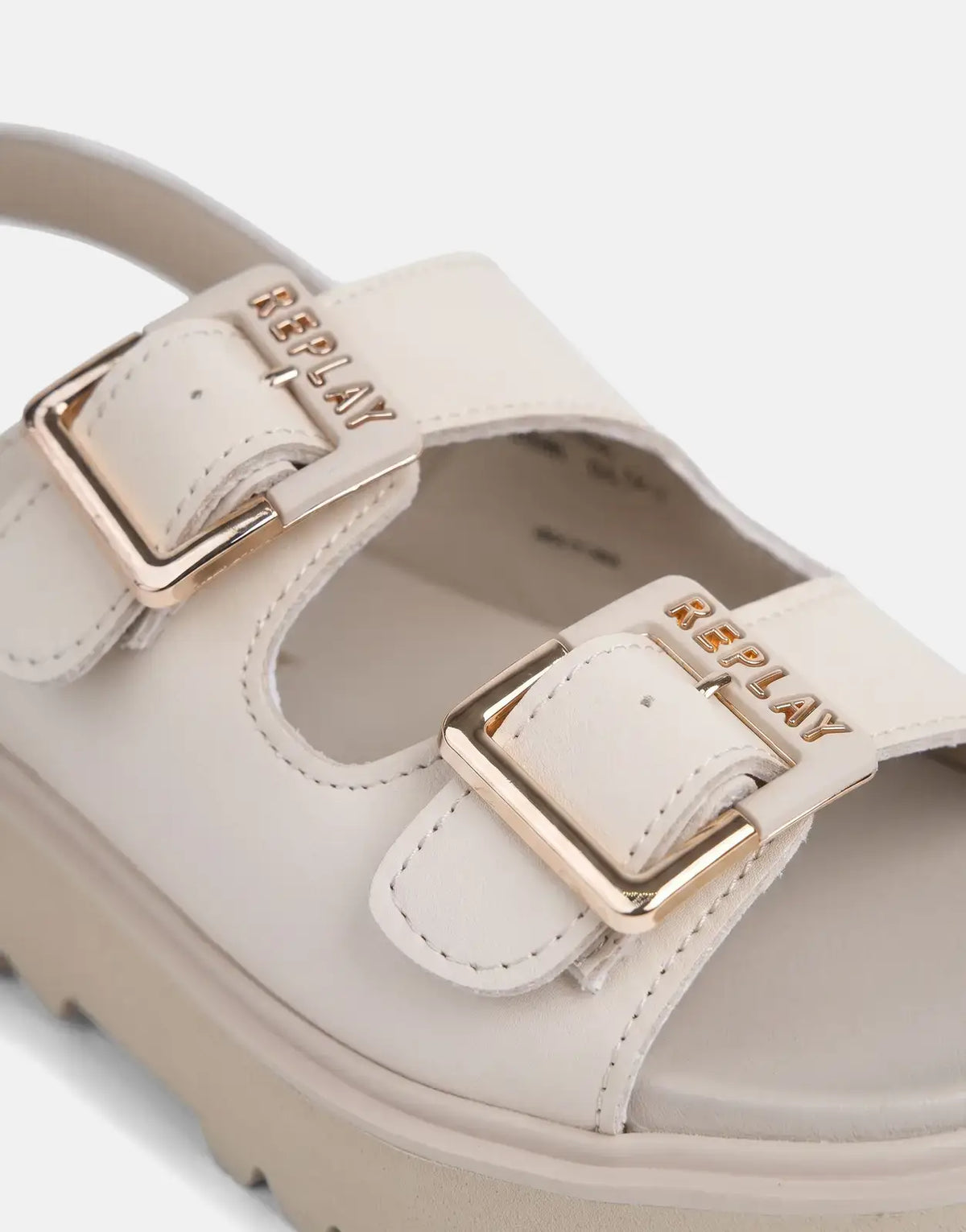 Replay New Alicante tonal beige women's sandal with gold buckles, shown from an elevated side view.