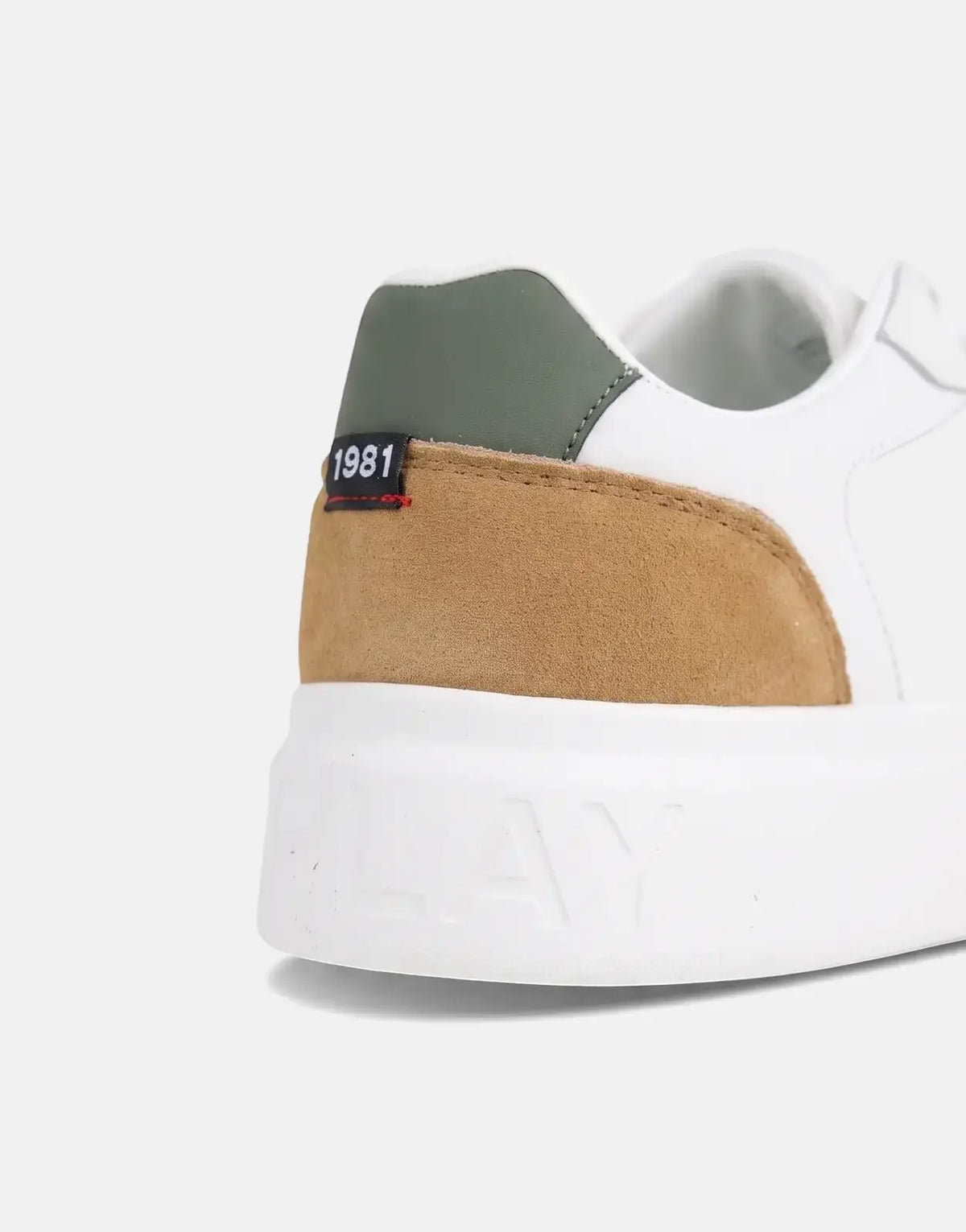 Close-up of a Replay Notting Agency white and tan suede low-top sneaker with a green heel accent and '1981' tag.