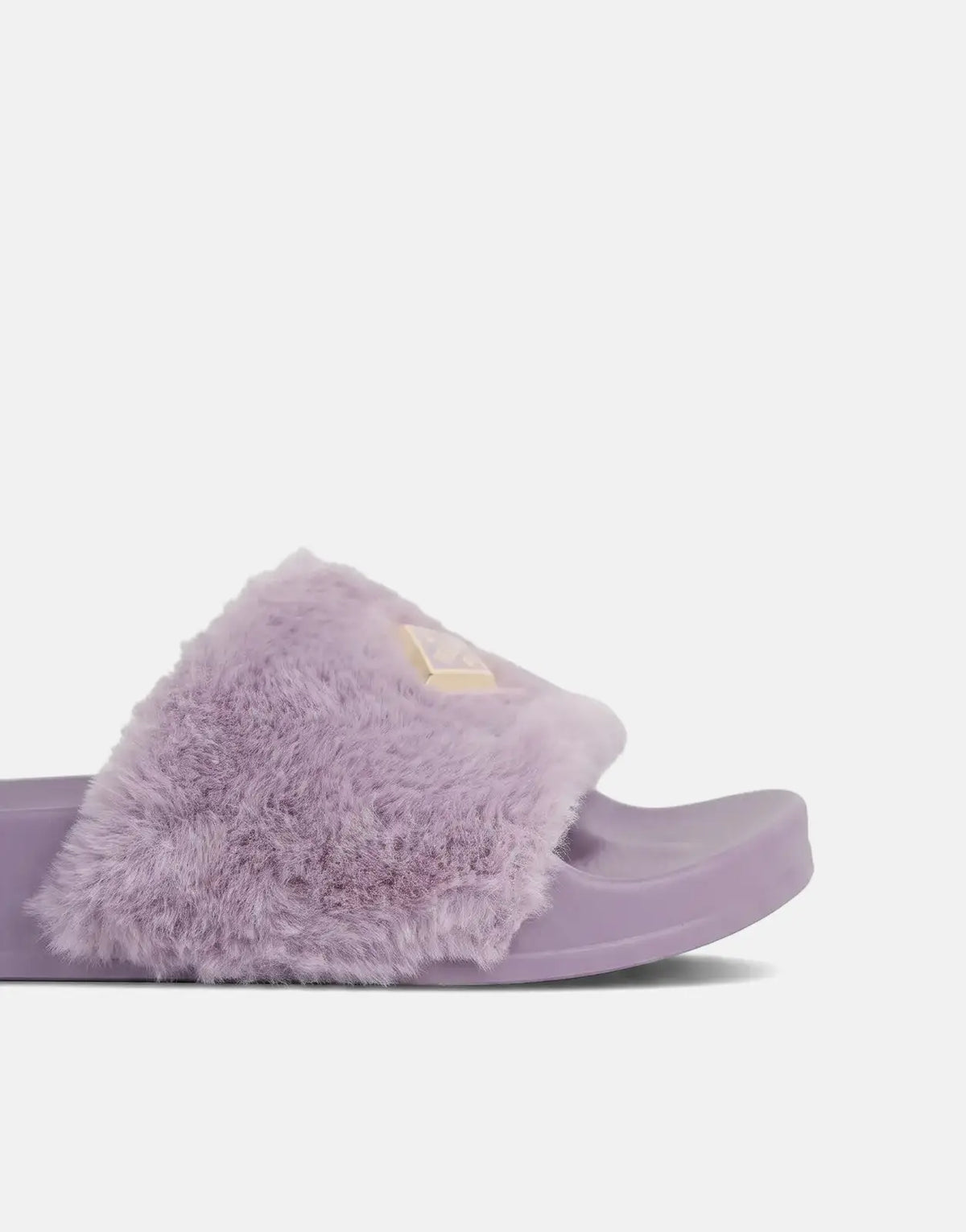 Replay Up W Along Lilac Slides with a fluffy purple strap and golden logo, viewed from the side.