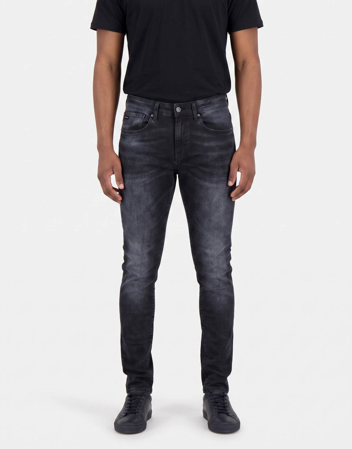 Men's TSHEPO Takalani C1 Mid Indigo Jeans, featuring a dark wash with subtle fading and a slim fit, shown from the front.