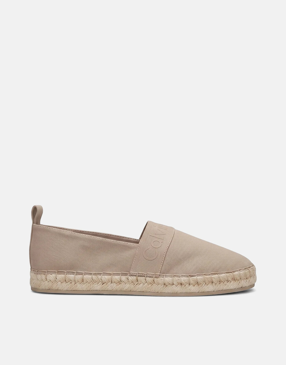 Light brown Calvin Klein Oblique espadrille shoe featuring a canvas upper, woven jute sole, and subtle branding on the