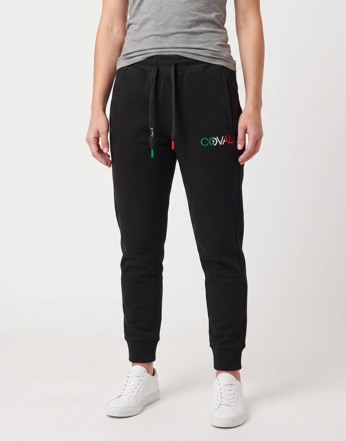 Black Covali Italiano-Sp sweatpants for women, featuring a front view with a logo, worn by a model.