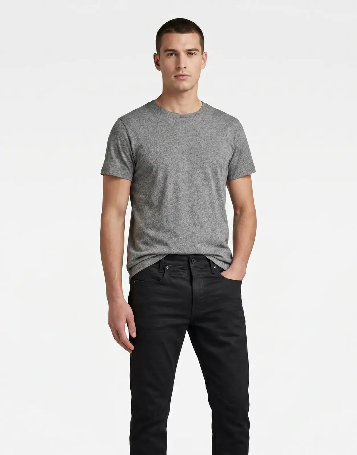 Black G-Star RAW D-Staq 3D Jeans for men, front view, showcasing the denim fabric and distinctive pocket details.