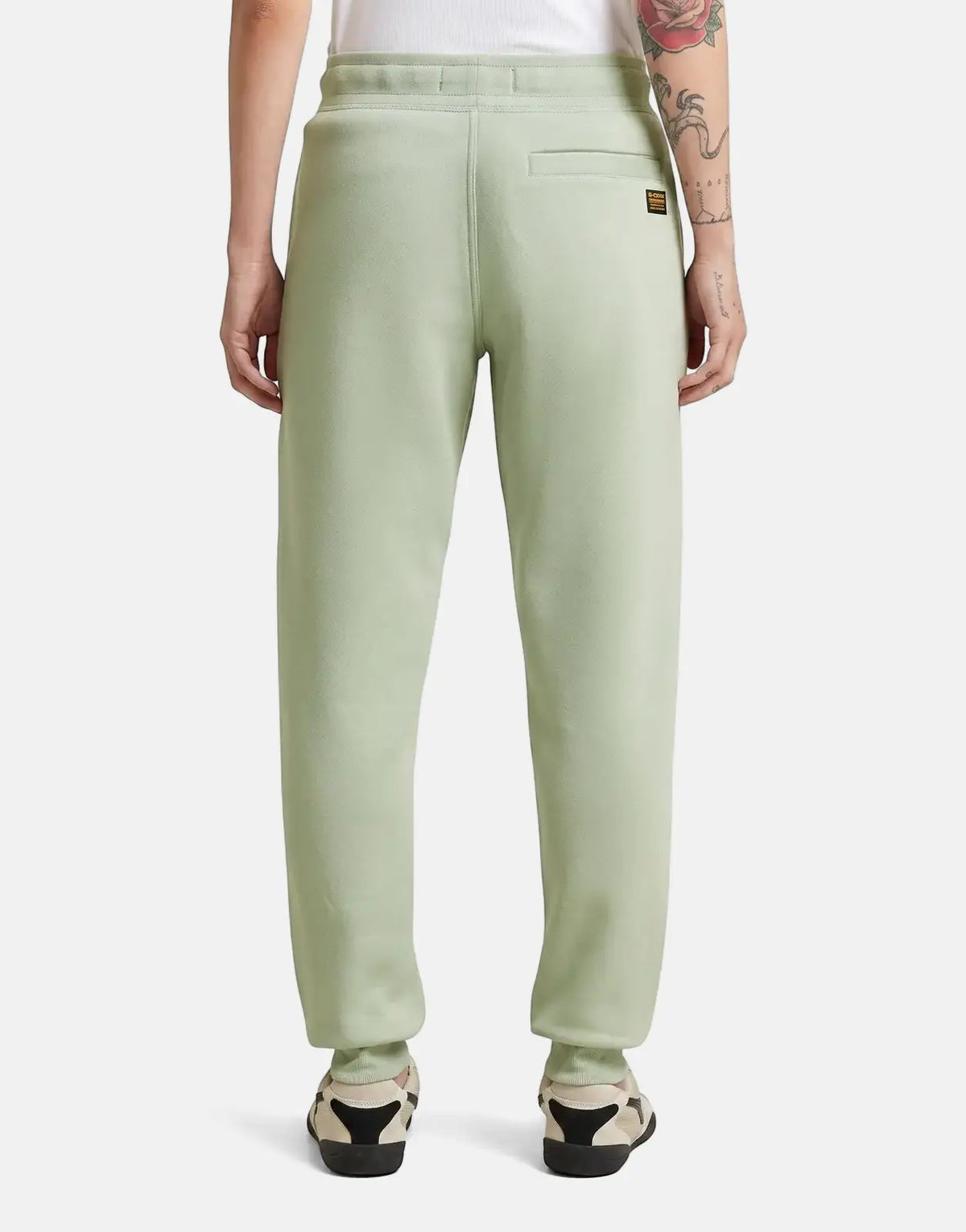 G-Star RAW Premium Core 2.0 Pale Green Sweatpants, featuring a relaxed fit and logo tag, modeled from the back. Ideal for