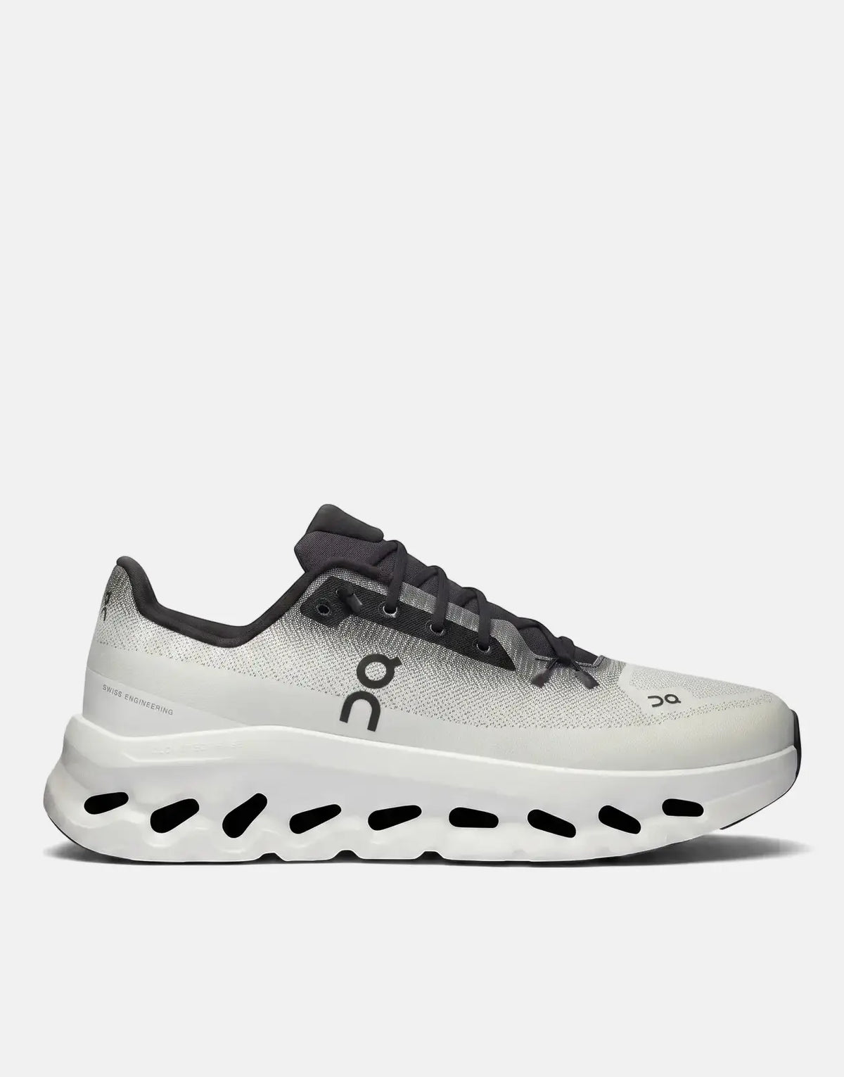 On Unisex Cloudtilt Black Ivory sneaker, featuring a white and black mesh upper and a unique white Cloudtec Phase sole, in