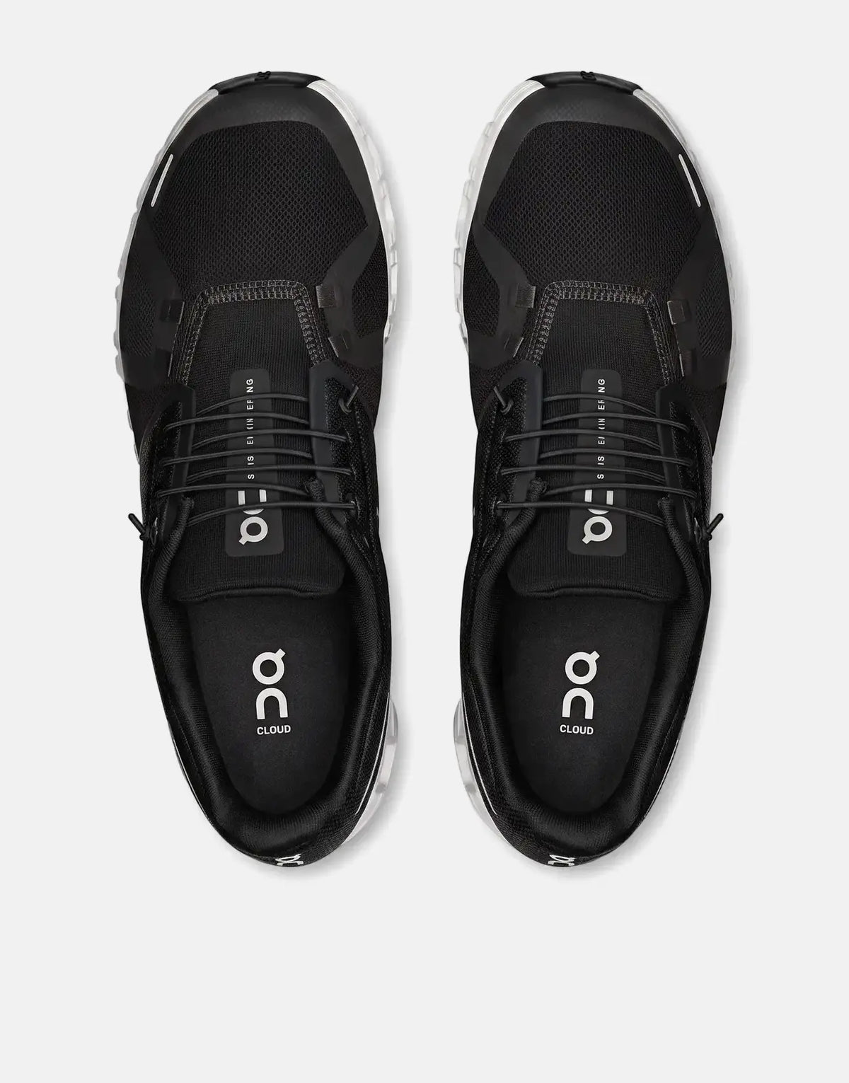 On Women's Cloud 6 Black White Sneakers, a pair of lightweight running shoes with black mesh uppers and white soles, viewed