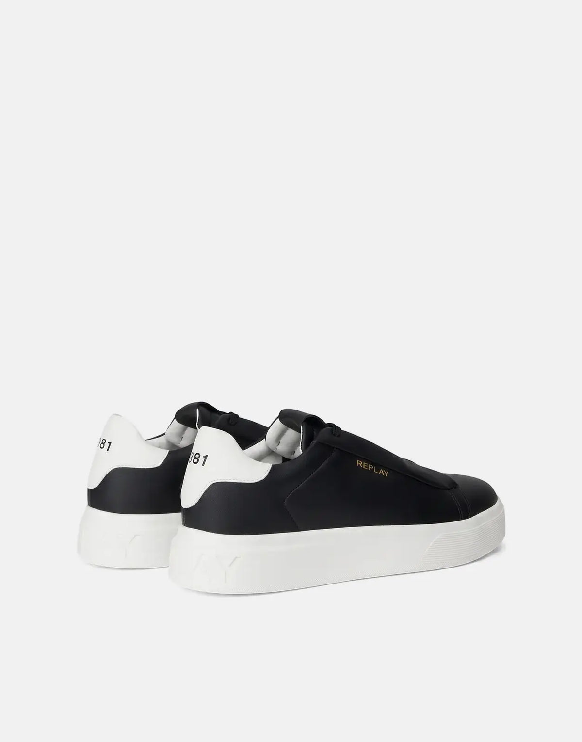 A pair of Replay Notting Medium black and white sneakers with white platform soles, viewed from the side-rear angle.