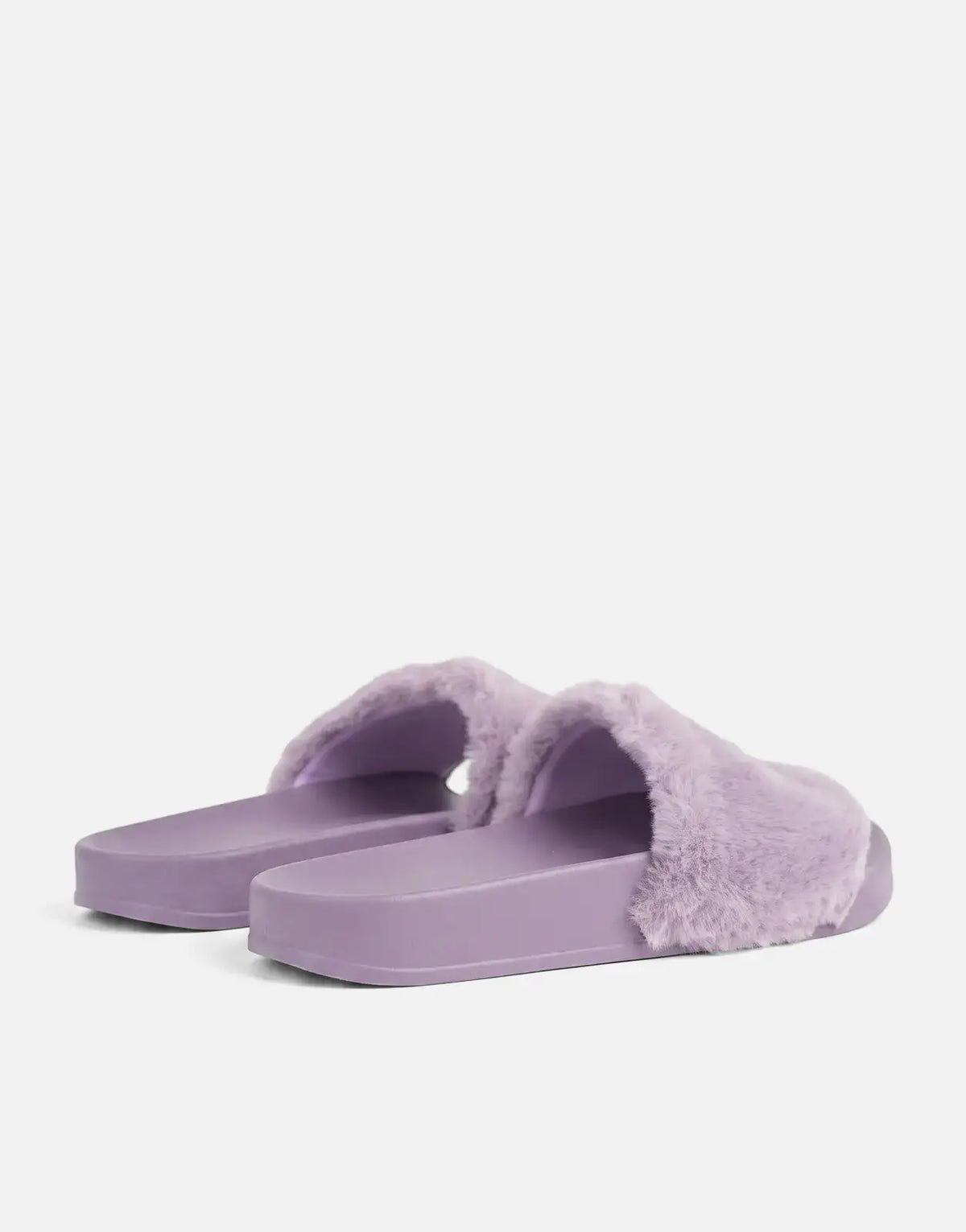 Pair of Replay Up W Along Lilac Slides, featuring soft fuzzy straps and a comfortable platform sole, presented from an